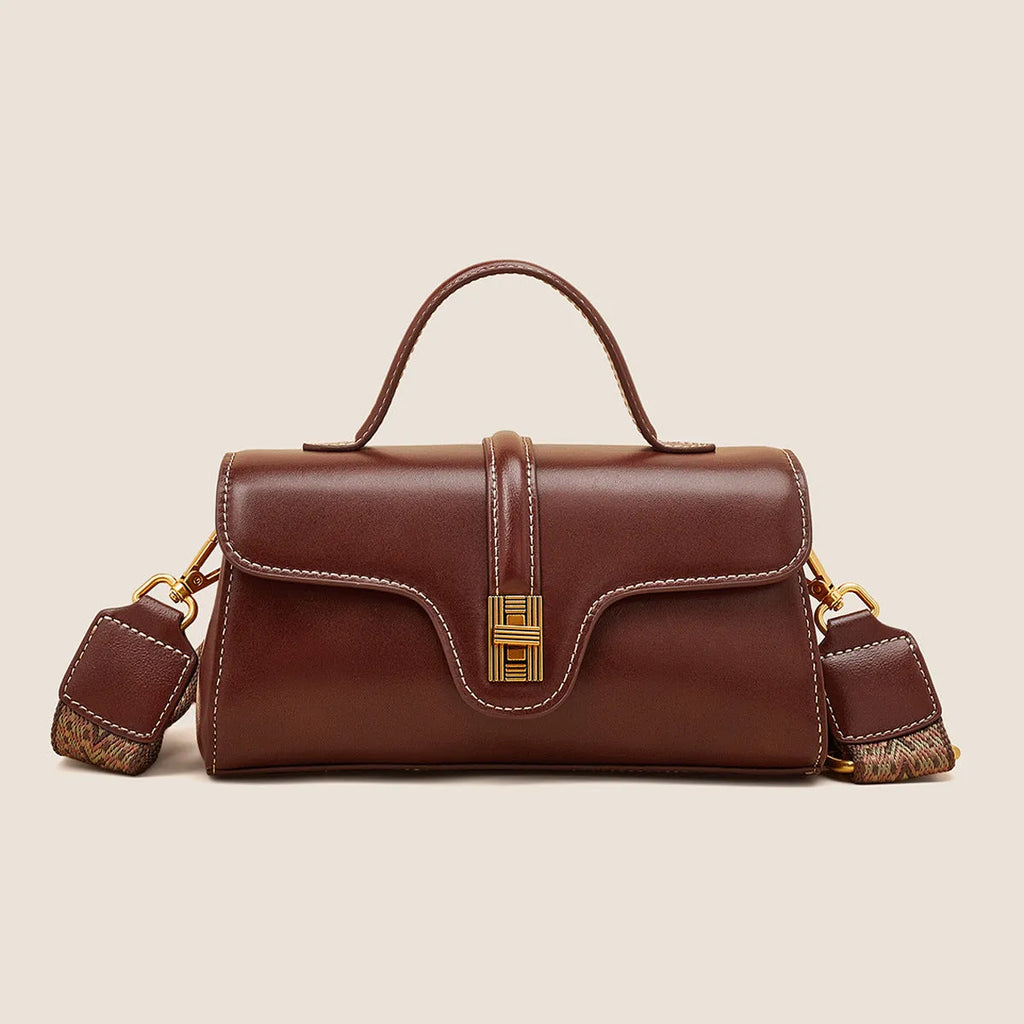 Niche retro Cambridge messenger bag in brown cow leather with lock detail and clamshell opening