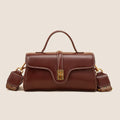 Niche retro Cambridge messenger bag in brown cow leather with lock detail and clamshell opening