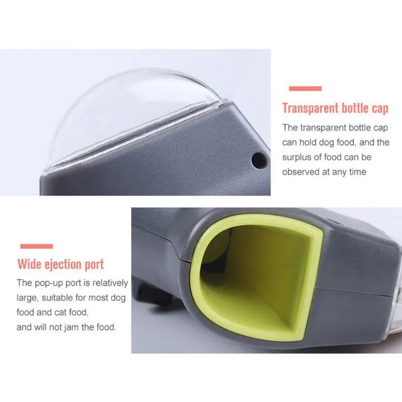 Grey pet snack catapult launcher for dog and cat training, showing handle and treat compartment