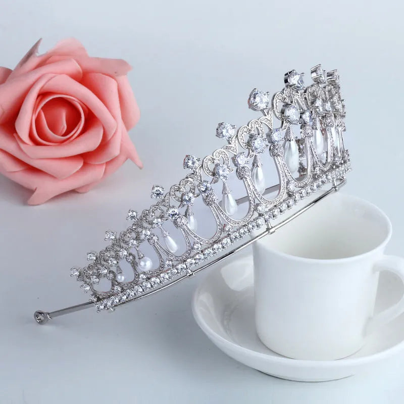 Silver bridal wedding tiara with AAA zircon and pearl tears on white background