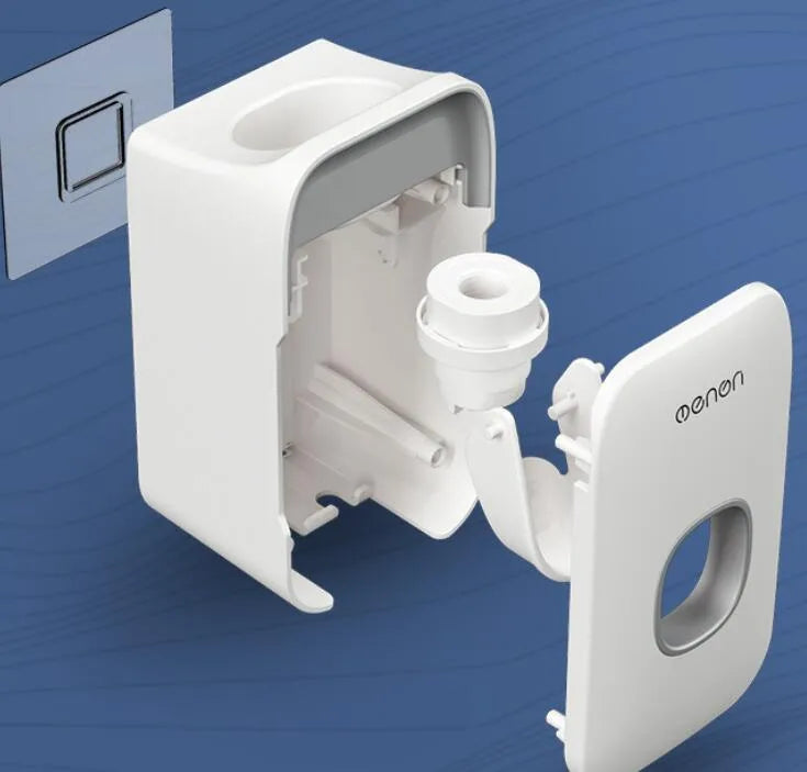 Blue automatic wall-mounted toothpaste dispenser with a sensor for touchless operation on a bathroom wall.