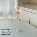 Clear glass French champagne goblet in one of seven styles: flute, tulip, waist, bevel, era or coupe.