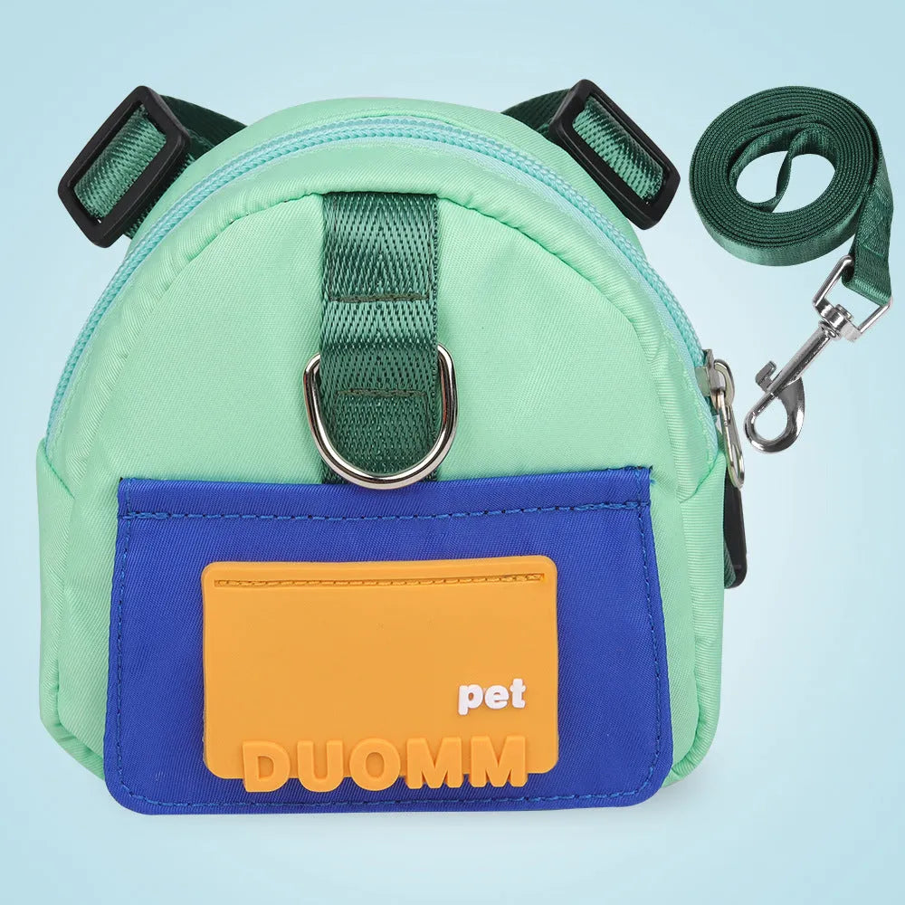 Blue adjustable dog backpack harness with tow rope and storage compartments on a medium-sized dog