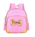 Nylon primary school backpack in blue with double straps, zipper closure, and breathable back panel