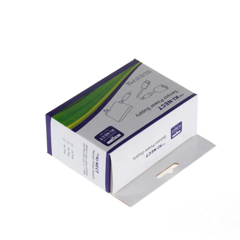 Xbox 360 Kinect power adapter with US and European plug options in European specification colour