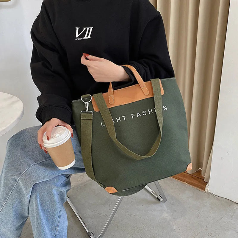 Canvas shoulder bag for women with letter print, large capacity, available in black, grey, white, khaki, and green colours