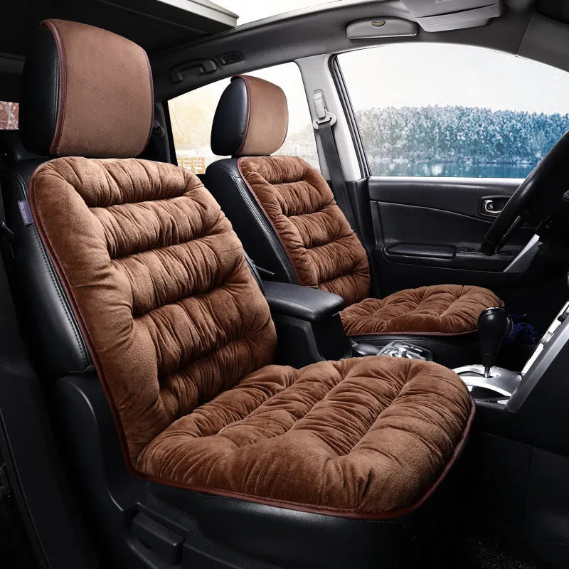 Universal winter warm plush car seat cushion in beige, fitting front seat of a car with elastic strap