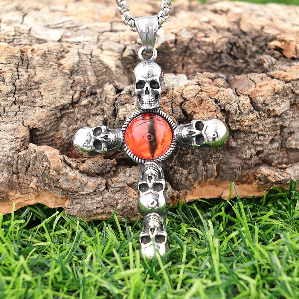 Stainless steel skull red eye cross pendant necklace with polished finish on 60cm square pearl chain, steel colour