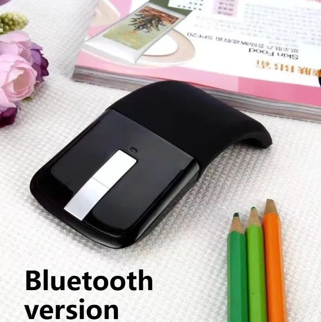 Folding Bluetooth wireless mouse shown in black colour, demonstrating compact folded and unfolded positions