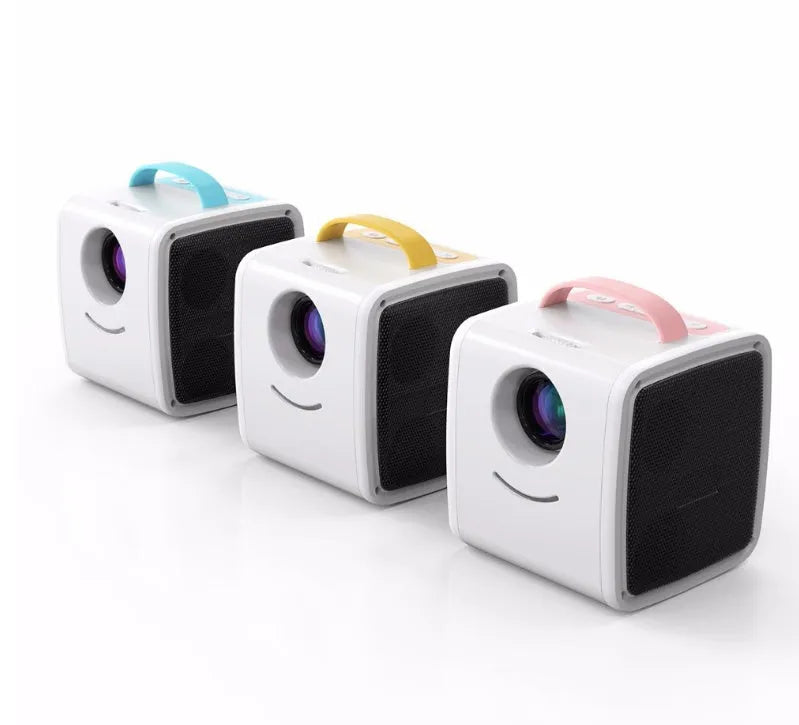 Mini home theater projector with 20W LED bulb projecting onto a wall, available in Blue US or Pink US colour options