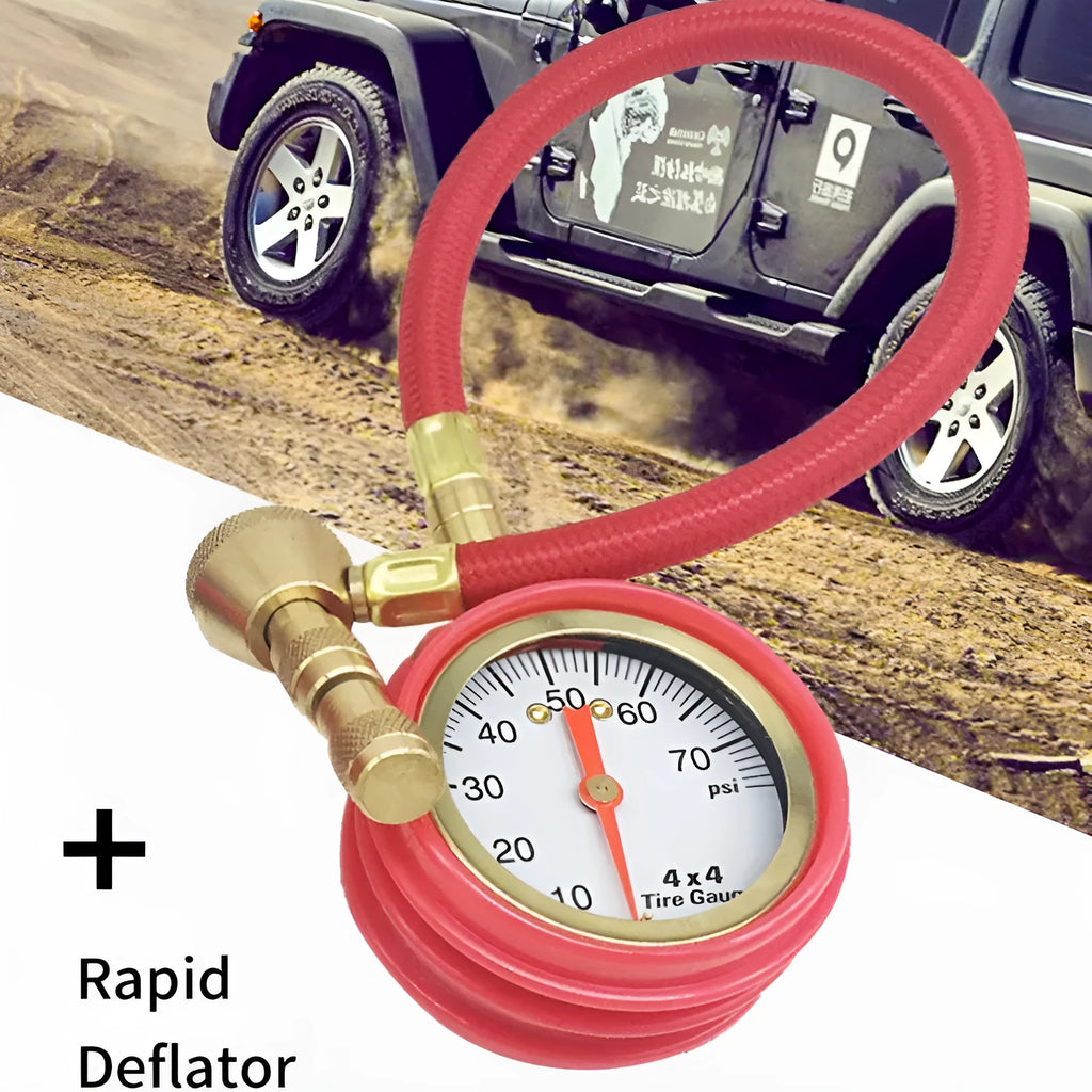 Red and black mechanical automobile tyre pressure gauge with a rubber shell and deflation button.