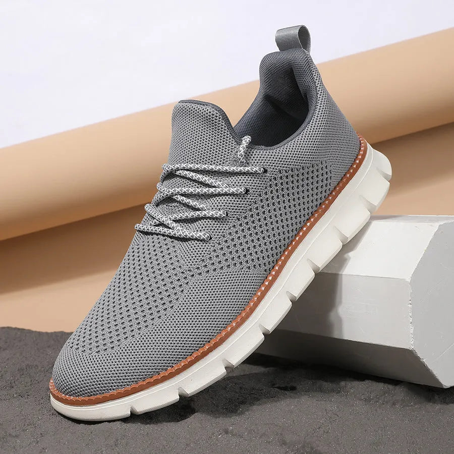 Men's grey mesh fabric casual sneakers with round toe and low heel design