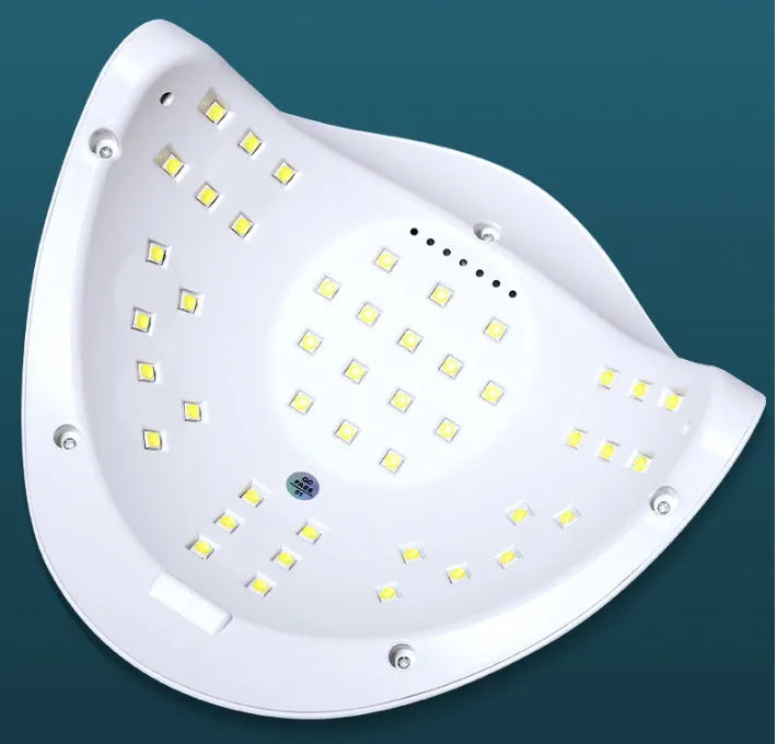 White ABS plastic nail curing lamp with dual UV and LED lights and timer buttons.