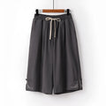 Women's wide leg linen leisure shorts in cotton fabric with embroidery detail and elasticated waistband