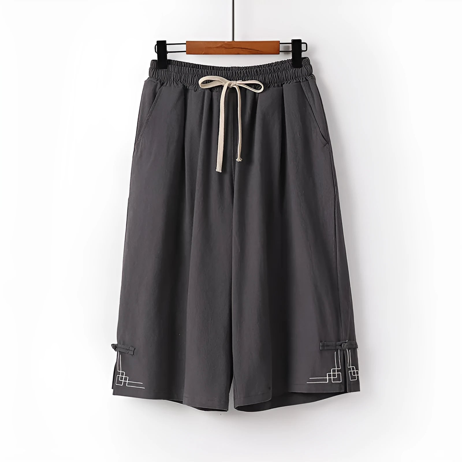 Women's wide leg linen leisure shorts in cotton fabric with embroidery detail and elasticated waistband