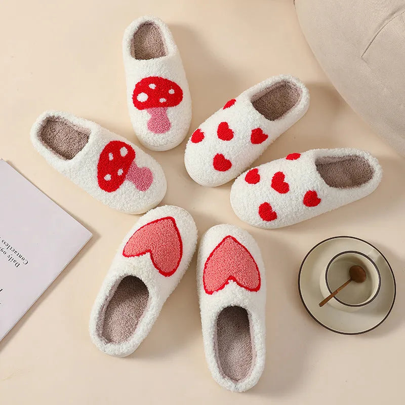Women's plush cartoon love style slippers with a PVC sole in multiple colour options.