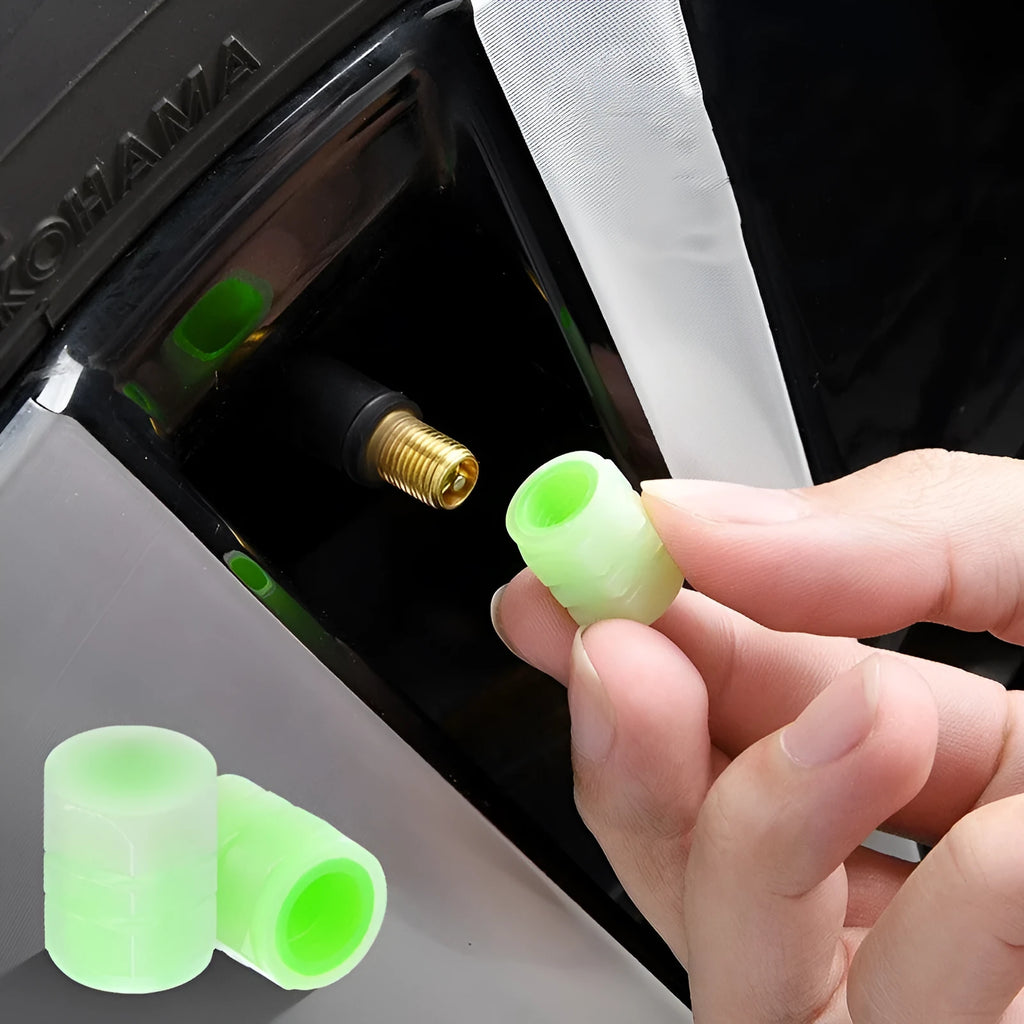Glow-in-the-dark rubber car valve caps in 16x12mm size showing luminous property
