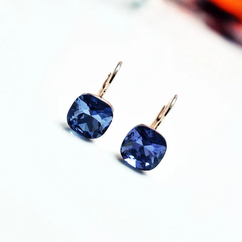 Austrian crystal copper geometric ear studs in Champagne Gold Blue colour