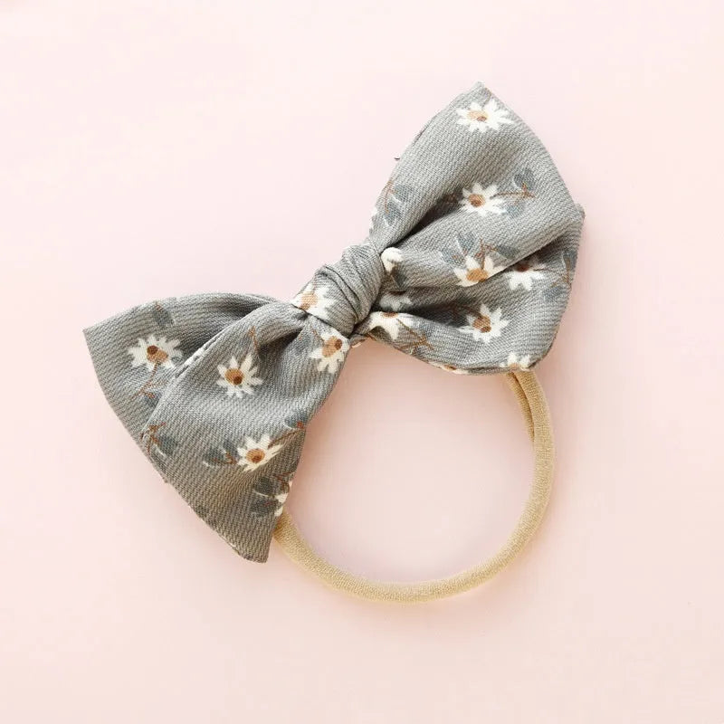 Children's knotted bow hair ring in cloth fabric with printed princess series design