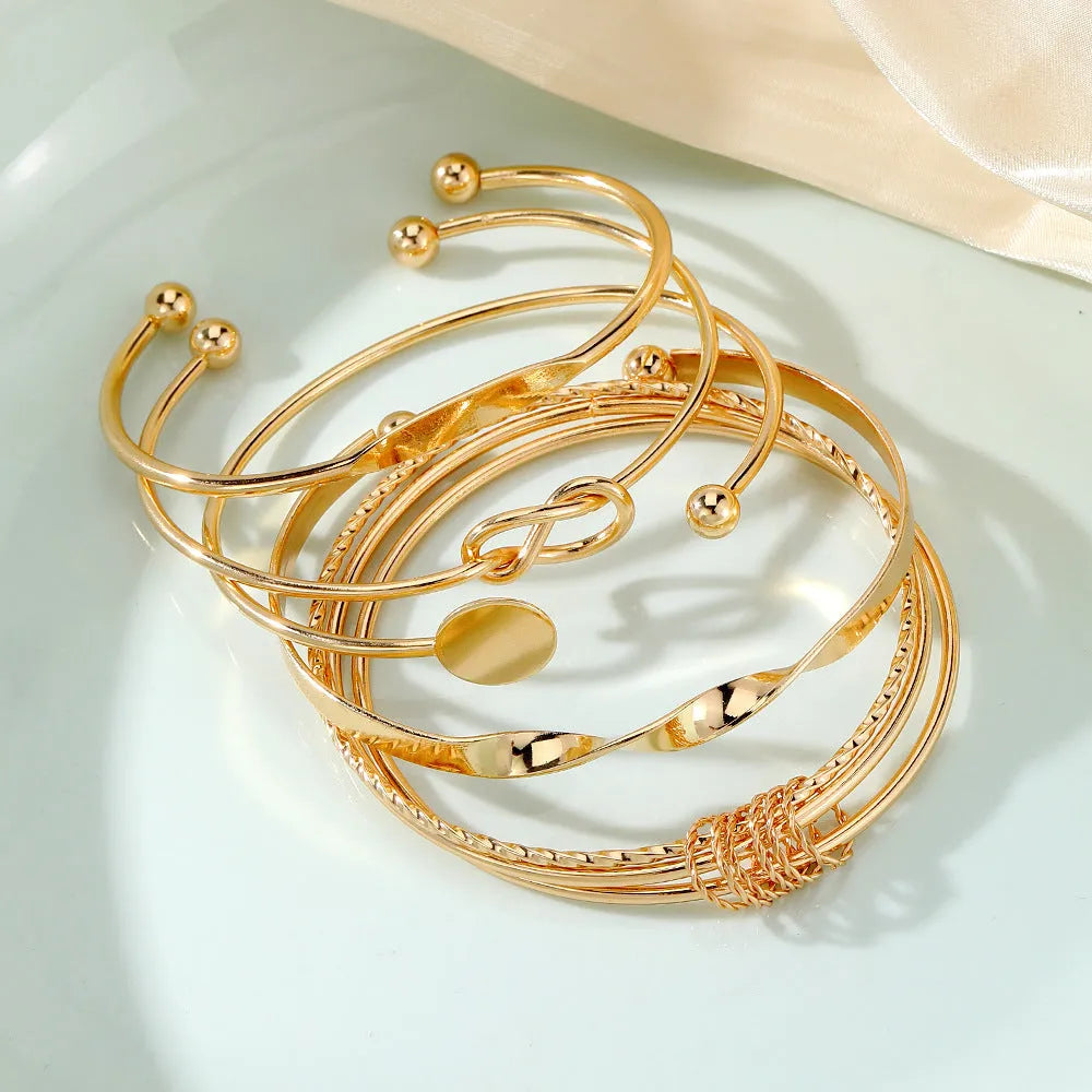 Set of five retro chain bracelets with geometric round, dot, and ring elements in electroplated alloy finish, HS1226 colour.
