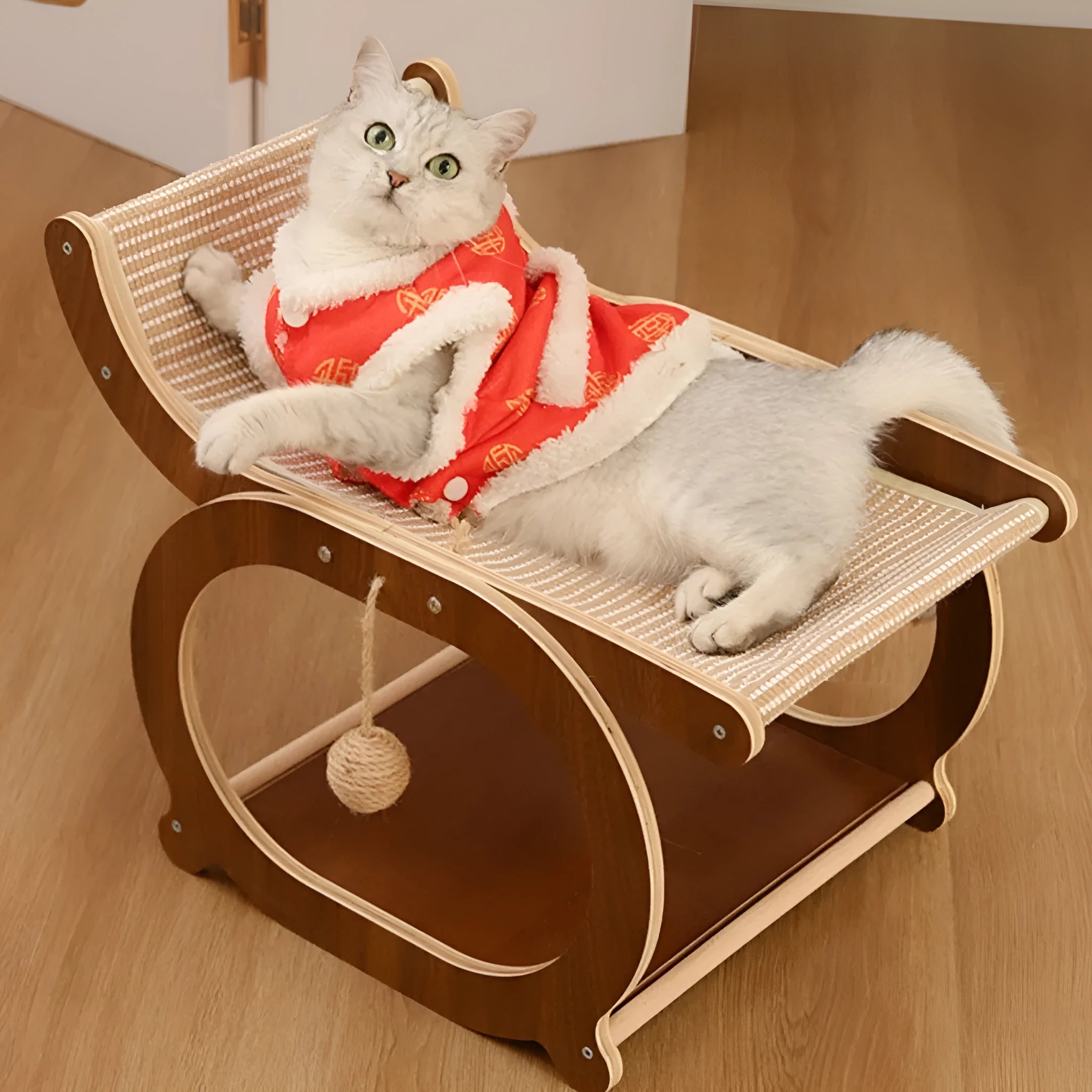 Solid wood cat bed with sisal scratching surface and recessed sleeping area in walnut colour finish.