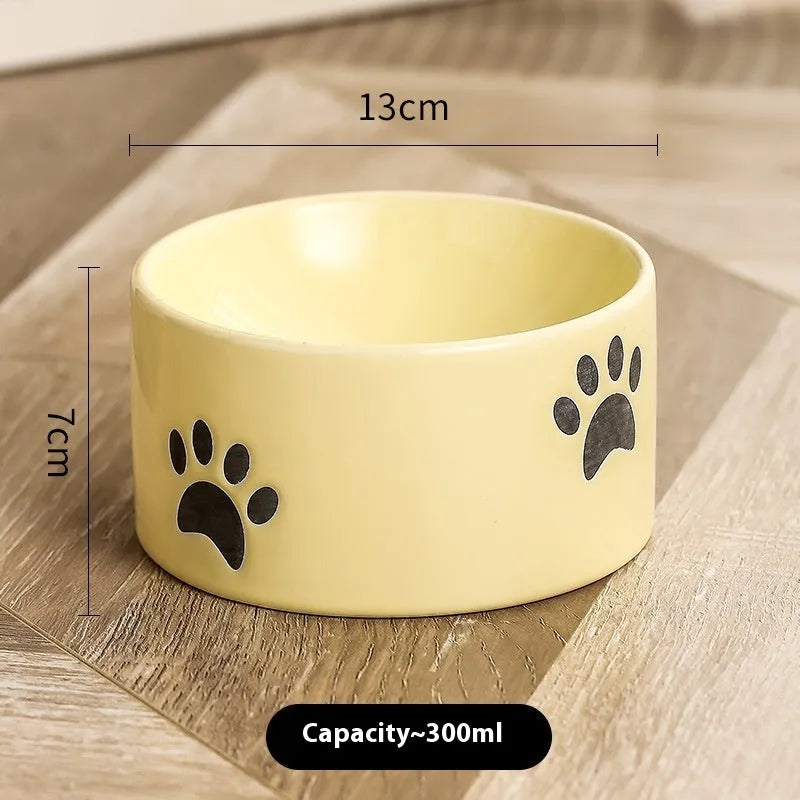 Ceramic cat food bowl with high foot and cat's paw print in chosen colour.