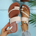 Women's casual open-toe sandals with artificial PU upper in beige, showing slip-on design and size 36-43 range