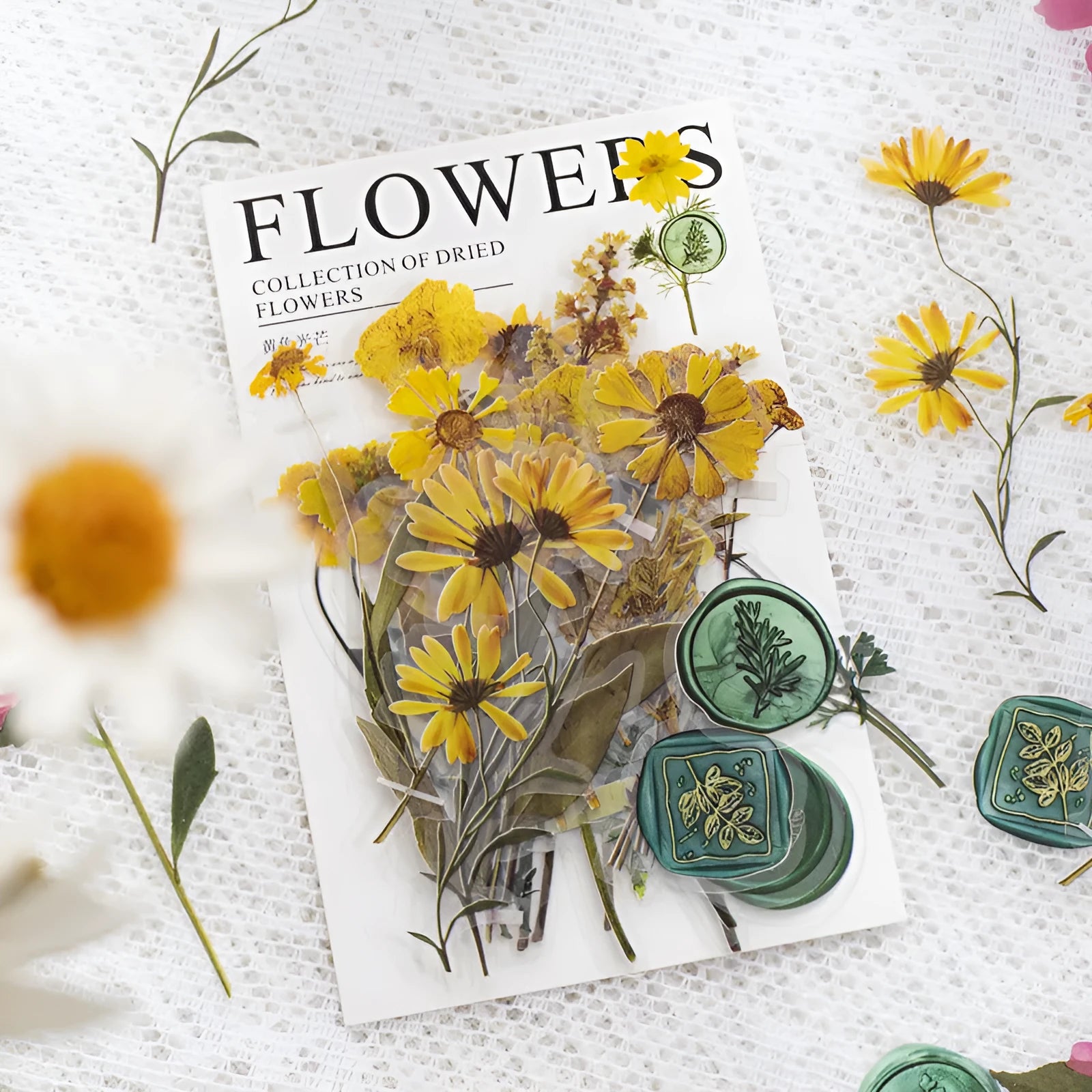 Square dried flower and fire paint design journal stickers in eight colour styles including purple, blue, orange, and pink.