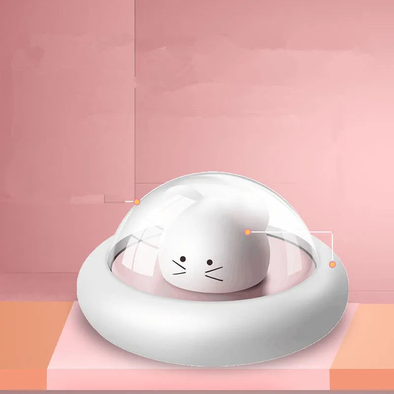 Space Moe Mouse children's bedroom night light in blue with push switch and warm LED glow on a bedside table