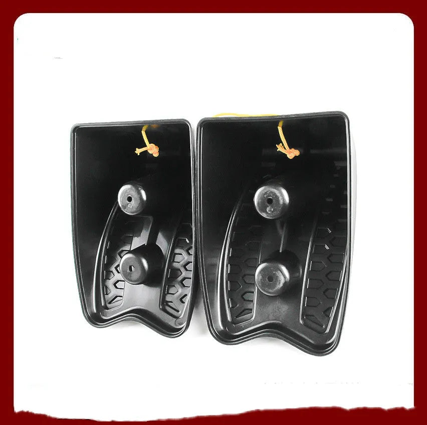 Black rubber automobile universal wheel stopper with triangular anti-slip base on sloped ground