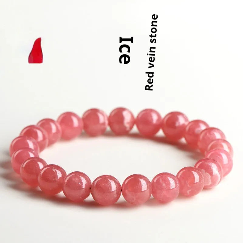 Women's geometric crystal bracelet with a Longevity Lock and red rhodochrosite stone beads.