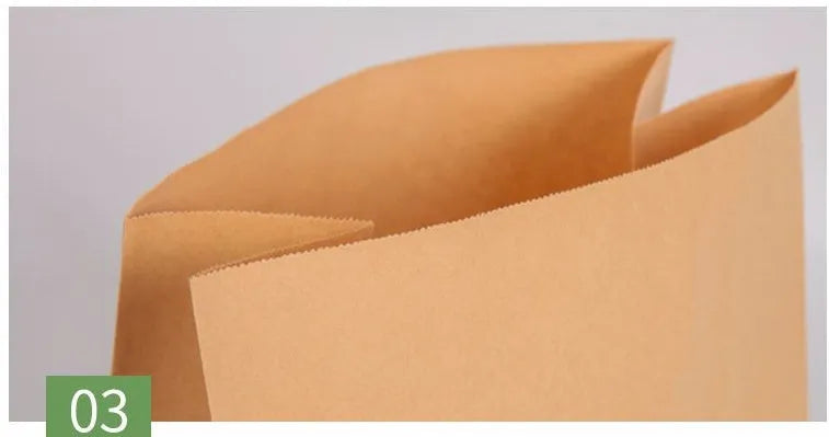 Yellow thickened kraft paper inner packaging bag with aluminium foil lining for snacks.
