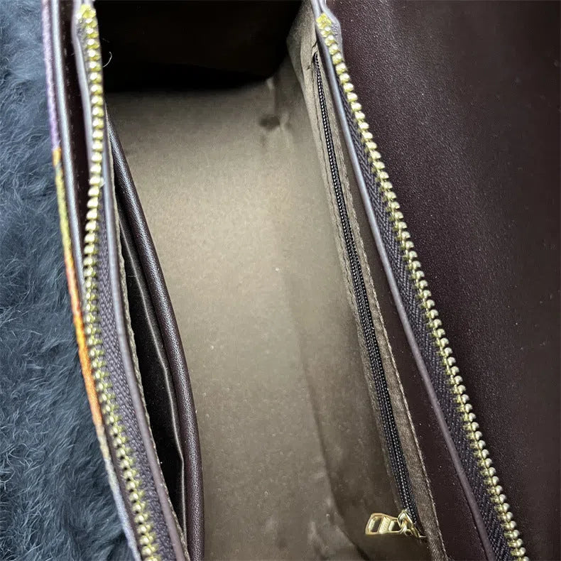 Vintage Chinese-style Xiangyun silk handbag with retro patterns, horizontal rectangular shape and single strap.