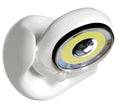 White Atomic Angel induction lamp with compact ABS housing on charging base.