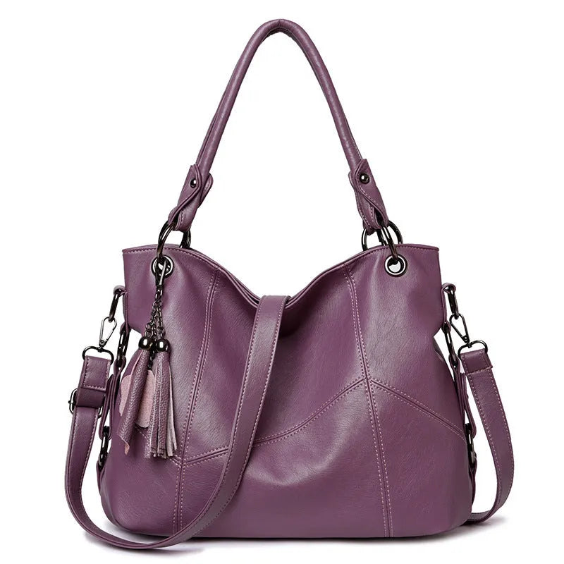 Women's PU tassel crossbody shoulder bag in bucket shape with three straps, available in black, blue, taro purple, wine red