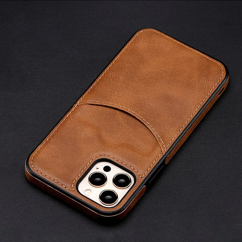 Dark blue PU leather protective case fitted on an iPhone showing precise button and port cutouts.