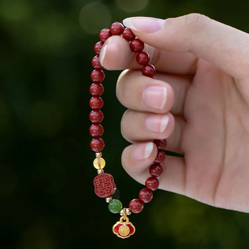 Happy Eyebrow Bracelet with fu charm in emperor sandstone colour, available in 6mm and 8mm sizes.