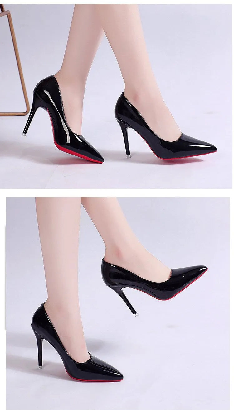 Women's black pointed toe stiletto pumps with a shallow mouth design on a white background.