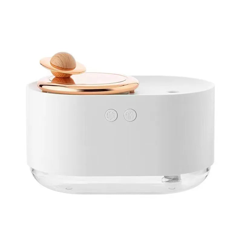 Green rotating planet USB humidifier with night light on wooden surface