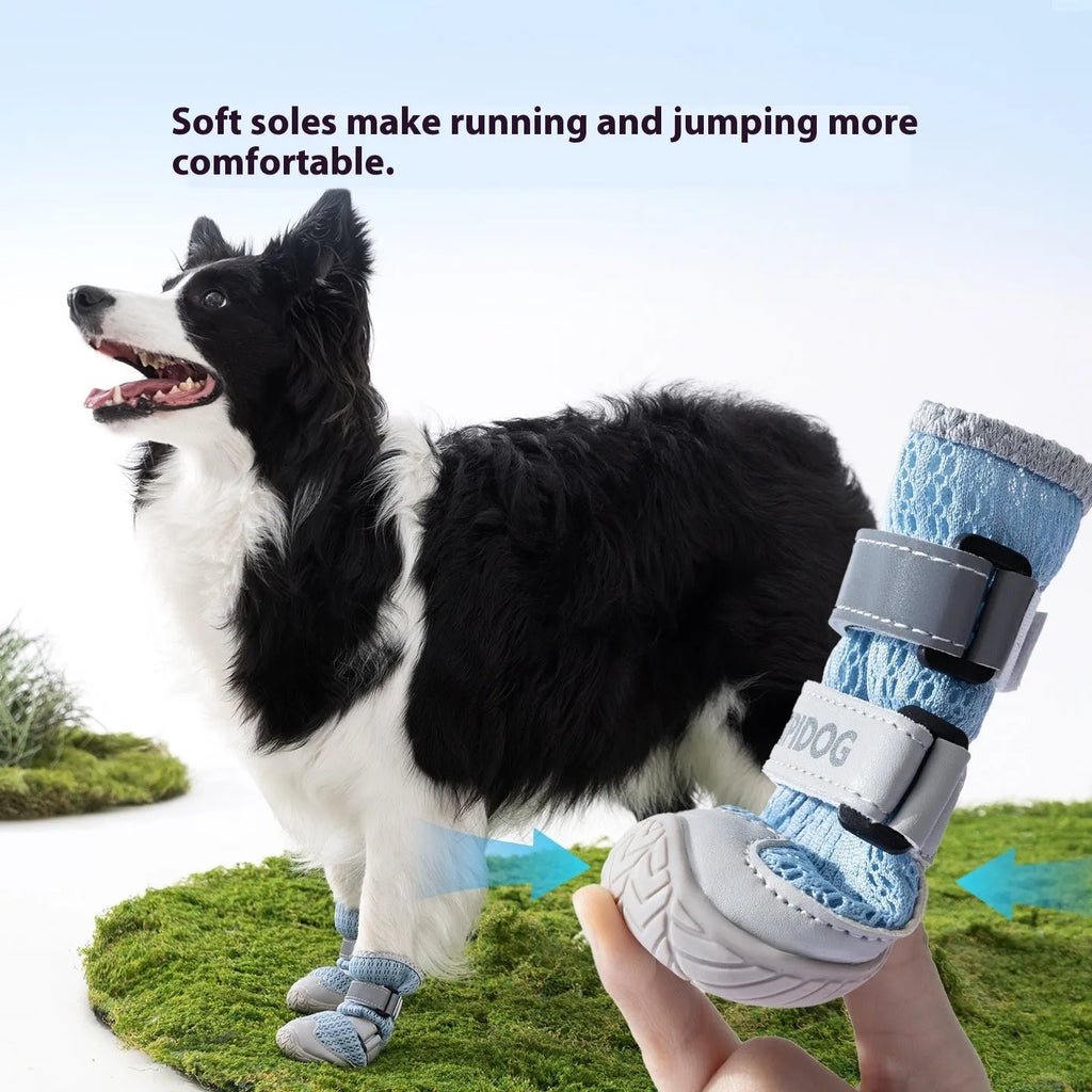 Pair of light blue cartoon-style dog shoes with breathable PU material on a white background.