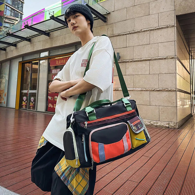 Large capacity sports shoulder messenger bag in black or khaki with 36-55L storage