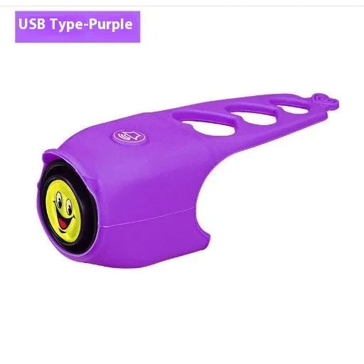 A plastic bicycle electronic horn in a choice of colours, showing handlebar mounting and two button cell batteries.