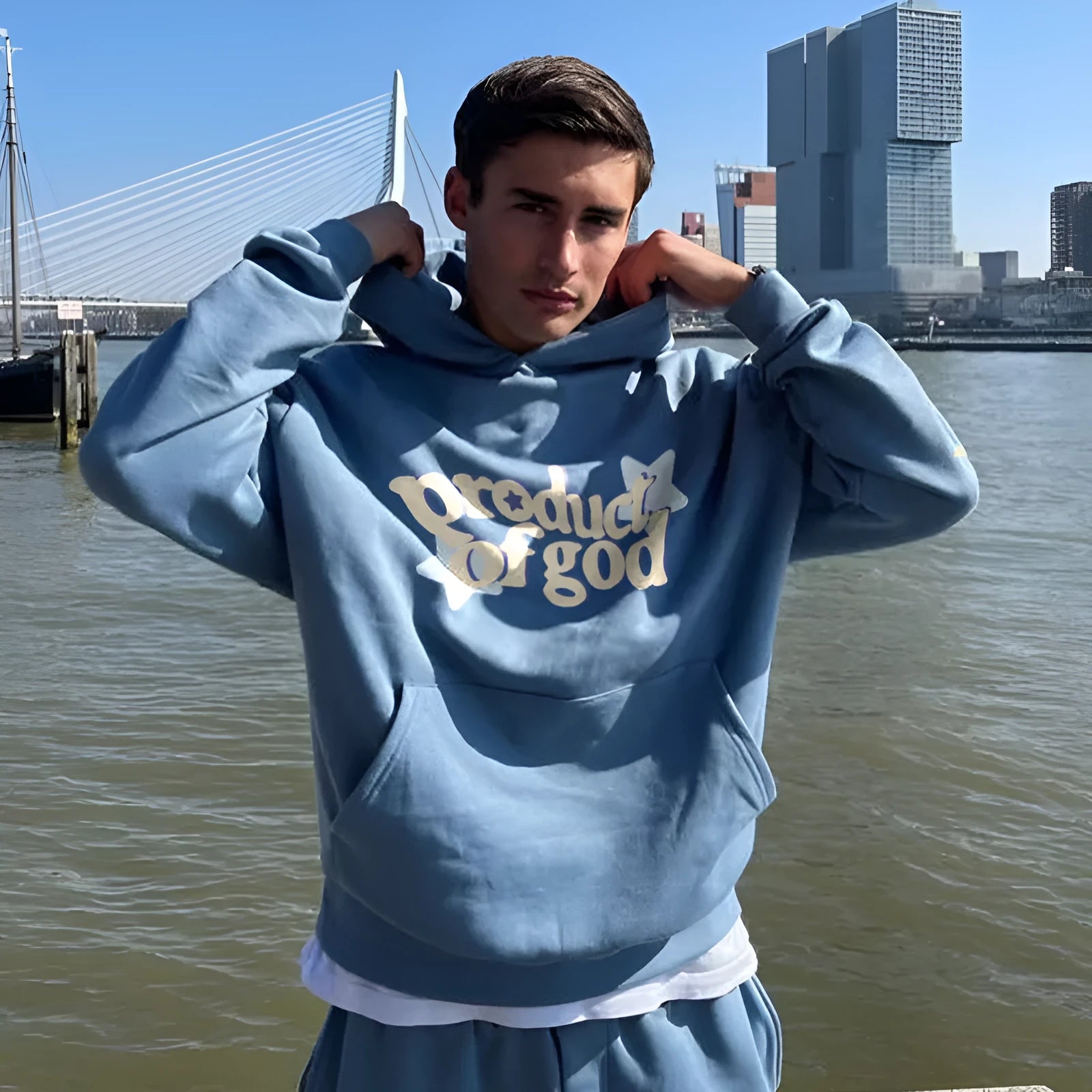 Men's blue printed pullover hoodie with front pocket and drawstring on polyester fabric