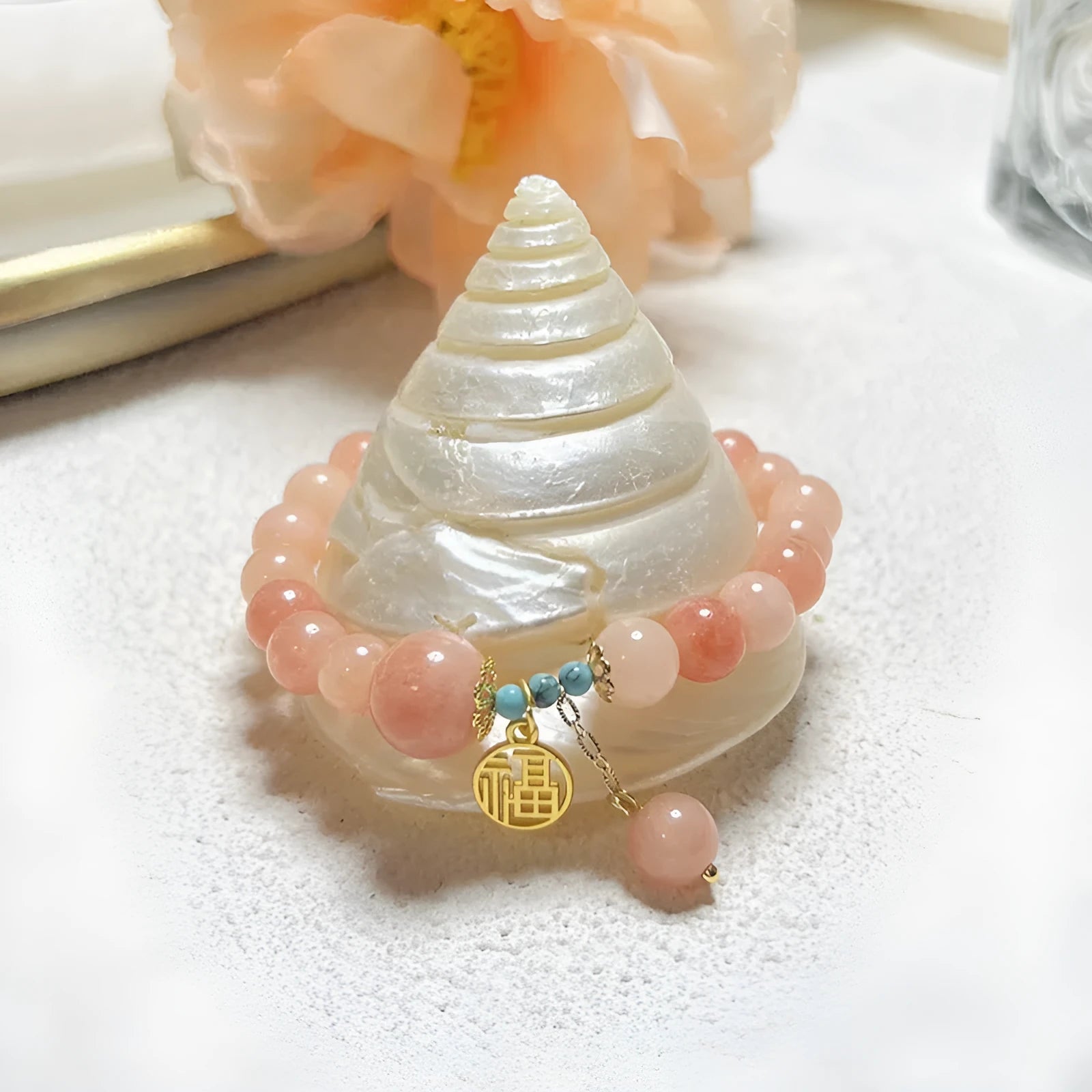 Pink natural stone charm bracelet with adjustable alloy chain for women