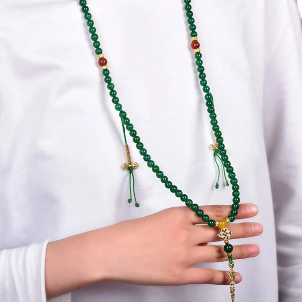 Natural green agate multi-circle bracelet for men and women on a wrist, showing different bead size options.