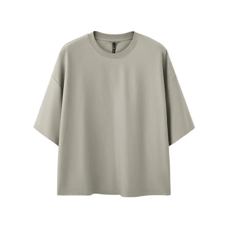 Men's sand grey loose fit short sleeve cotton polyester t-shirt laid flat.