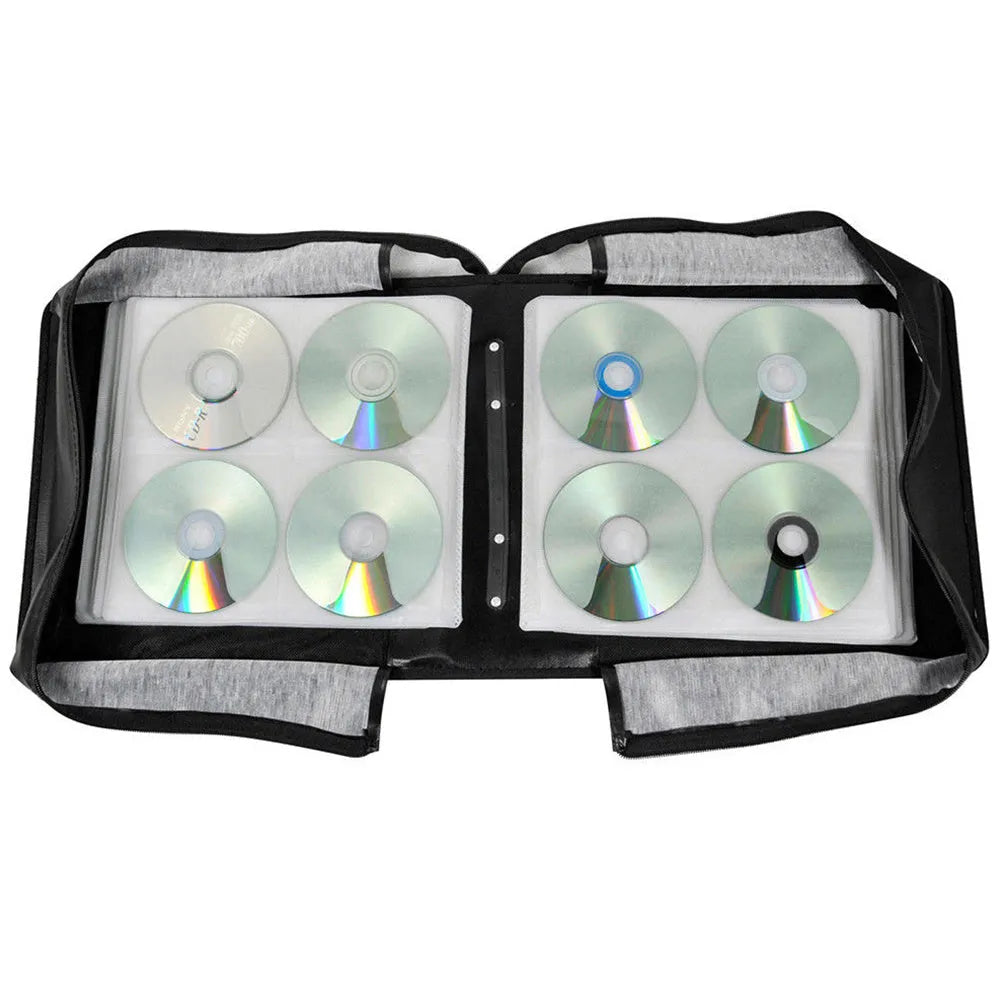 Black Oxford fabric CD and DVD storage binder with a zip and top carry strap.