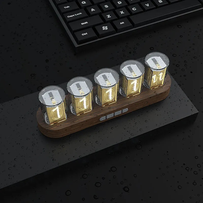 RGB Luminotron LED digital clock showing colourful display on desk