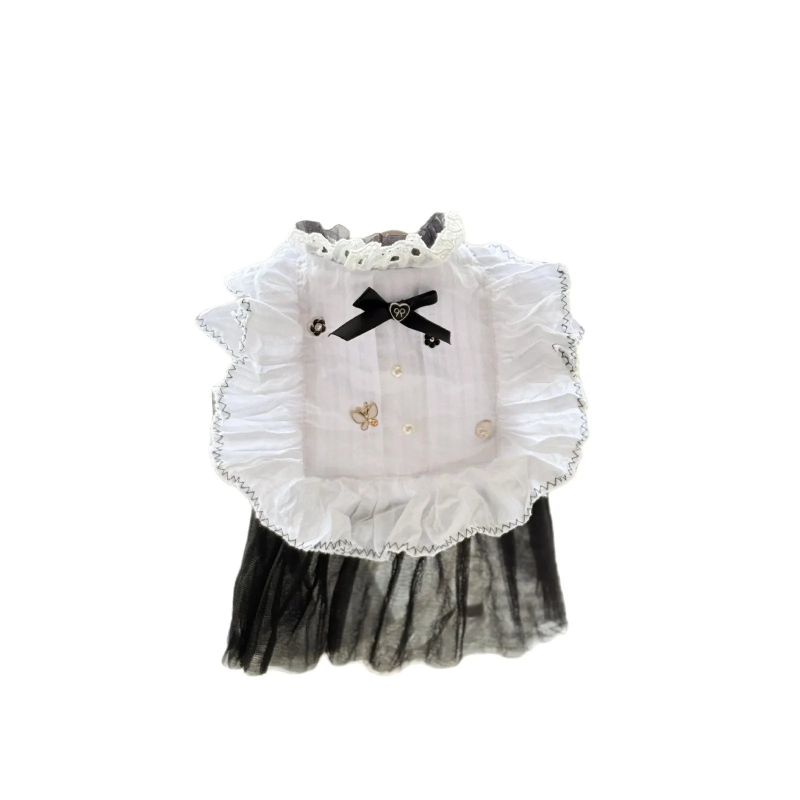 White polyester gauze skirt dog dress on a small dog, showing princess-style gathered skirt.
