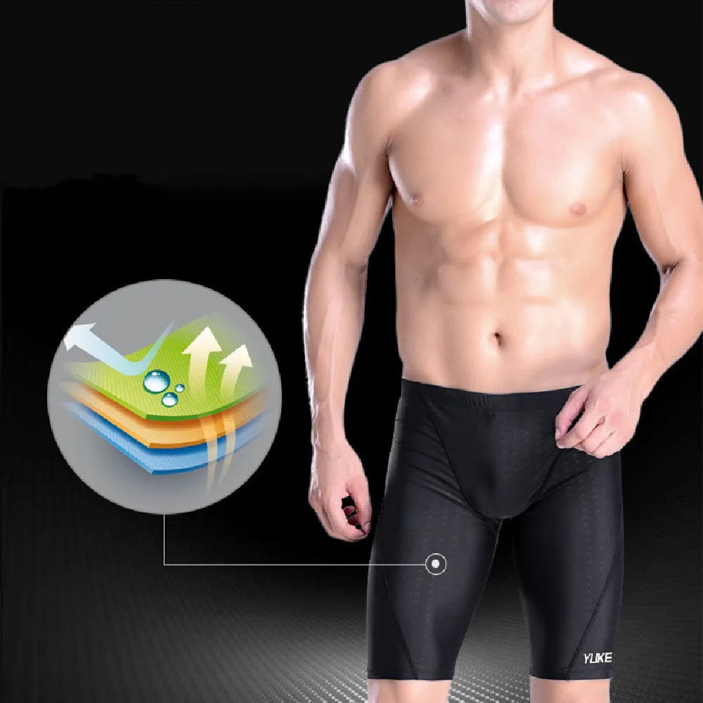 Men's black 5-piece swimming set showing swimming trunks, goggles, cap, ear plugs with nose clip, and carrying bag